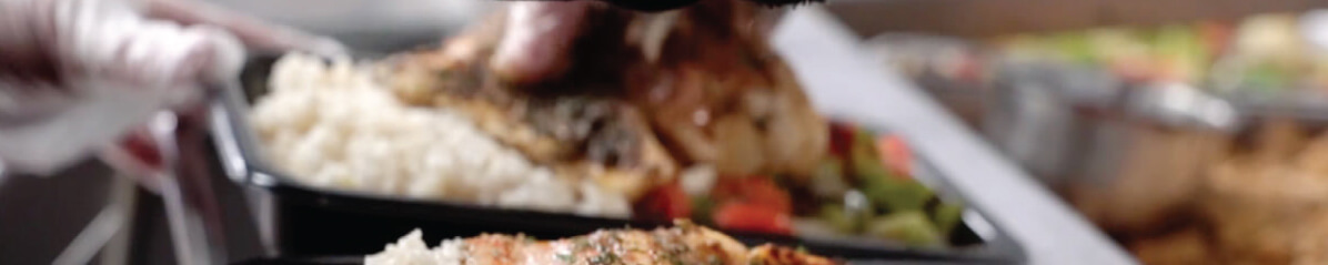 Healthy meals plated in a microwave safe meal prep container