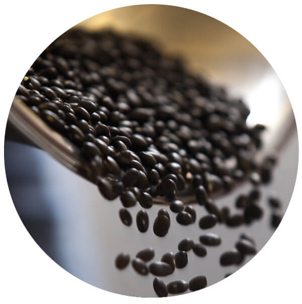 Picture of black beans being tossed in a mixing bowl that will later be used to prepare your meals. Picture of black beans being tossed in a mixing bowl that will later be used to prepare your meals.