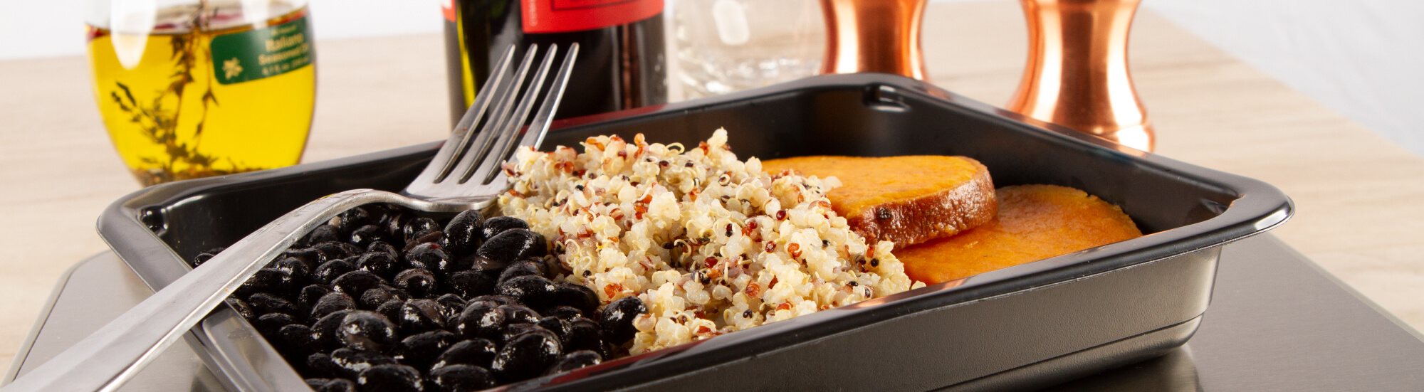 Picture of Munchery  meals plated in a microwave safe  meal prep containers