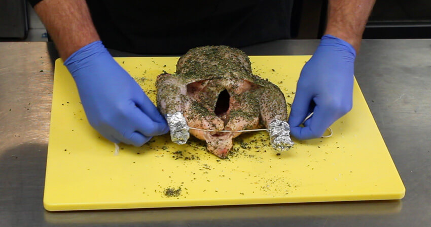 Rotisserie Chicken use twine for hind legs