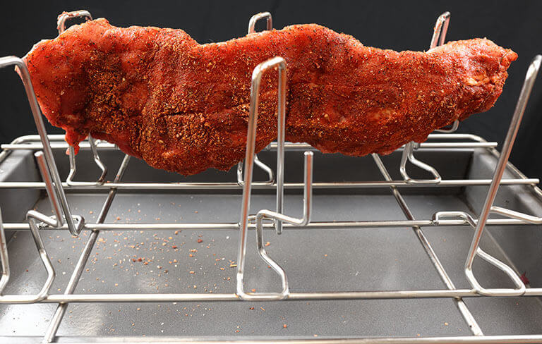 seasoned ribs on oven roasting rack